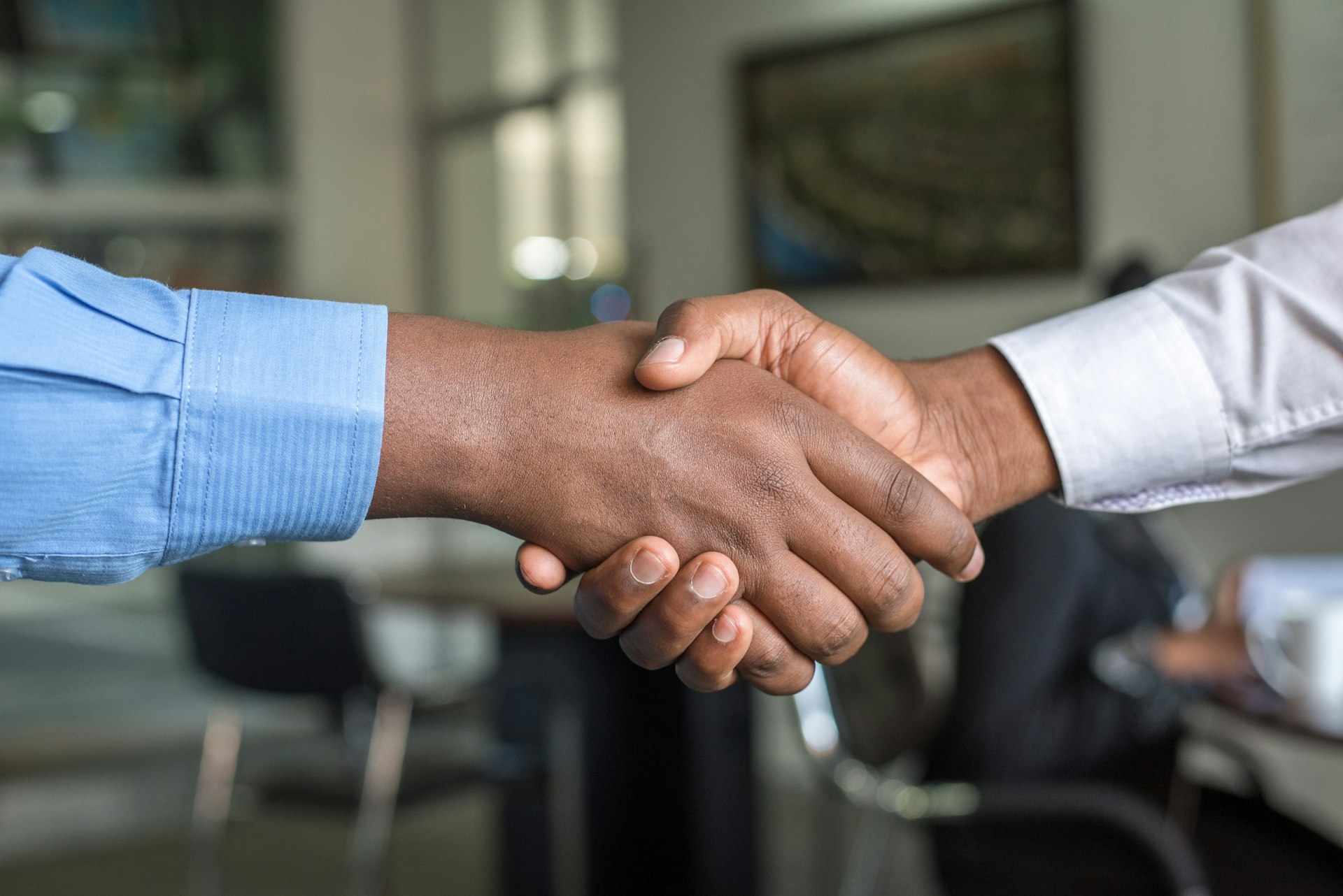 A New Leaf Financial Solutions consultant shaking hands with a client in Pretoria
